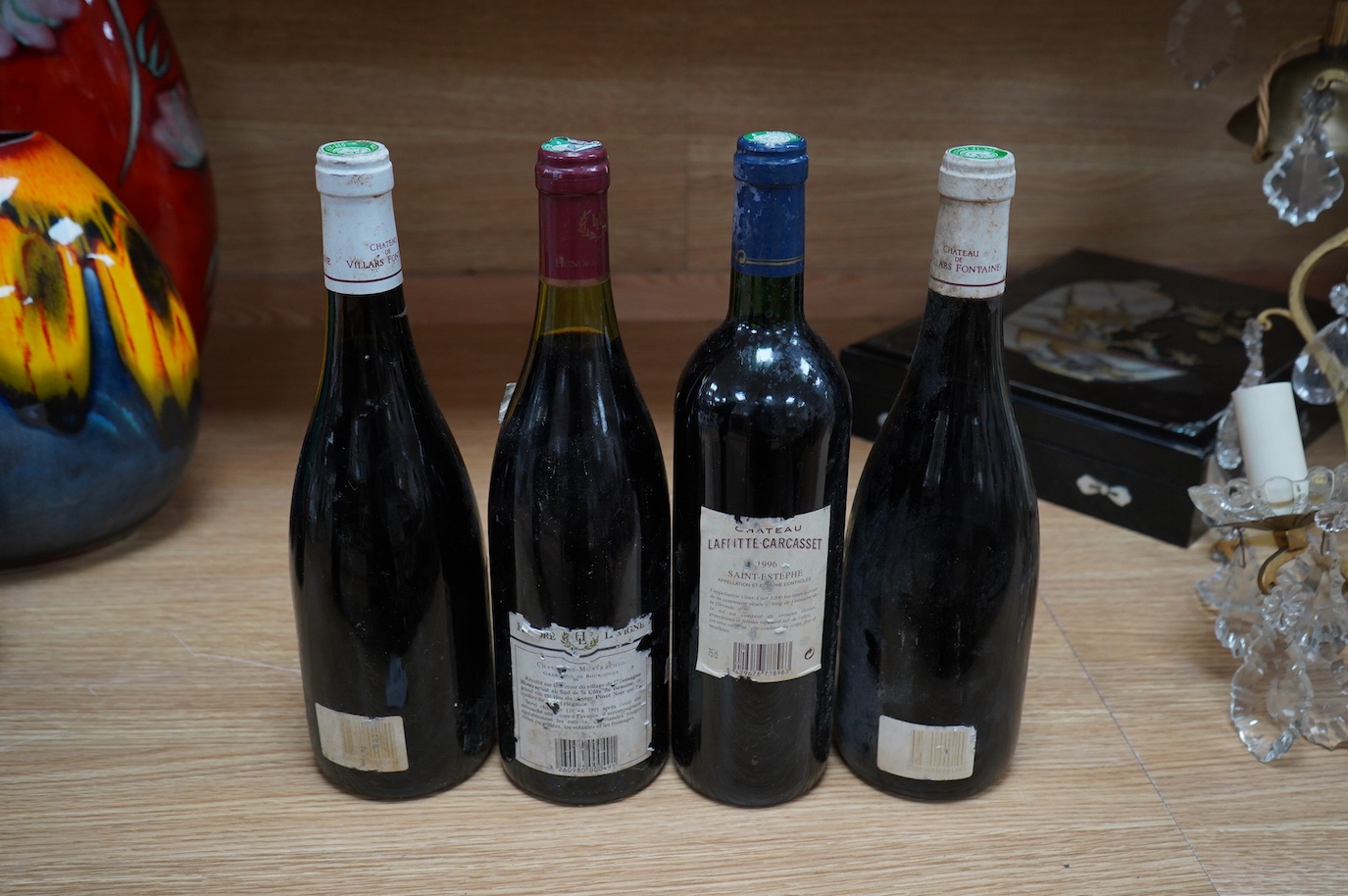 Three bottles of various Burgundy wine to include two bottles of Bourgogne 1990 together with a bottle of claret. Condition - fair, storage history unknown